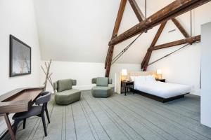 Ένα ή περισσότερα κρεβάτια σε δωμάτιο στο The Richardson Hotel +57 φωτογραφίες