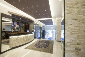 TV a/nebo společenská místnost v ubytování Hotel King
