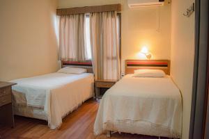 Katil atau katil-katil dalam bilik di Hotel Rio Dorado