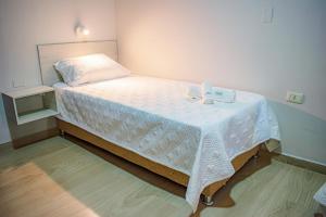 Katil atau katil-katil dalam bilik di Hotel Rio Dorado