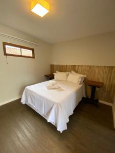 Katil atau katil-katil dalam bilik di Pousada Villa Manso