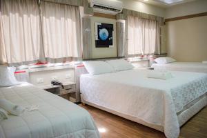 Postel nebo postele na pokoji v ubytování Hotel Rio Dorado + 37 fotografií