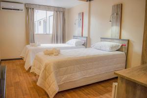 Katil atau katil-katil dalam bilik di Hotel Rio Dorado