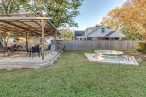 a backyard with a patio with a fire pit at The Wingate Nashville Hot Tub & Airstream Oasis in Nashville