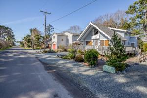 a house on the side of a road at Play Chalet MCA 489 - Meredith Lodging in Manzanita