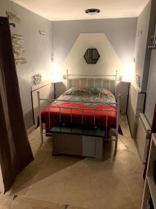 Ένα ή περισσότερα κρεβάτια σε δωμάτιο στο Très bel appartement cosy et chaleureux à Nîmes