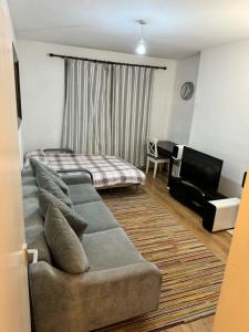 TV a/nebo společenská místnost v ubytování londesborough inn + 2 fotografie