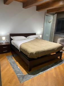 Postel nebo postele na pokoji v ubytování La casa di Cate & Adry
