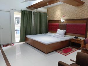 Ένα ή περισσότερα κρεβάτια σε δωμάτιο στο Hotel Red Roof Inn
