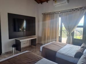 Voodi või voodid majutusasutuse Hotel Palmas De Alcalá toas