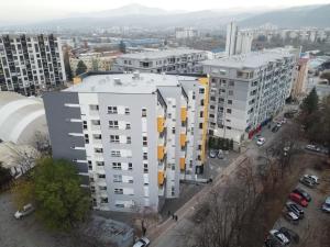 an overhead view of a large white apartment building at Green Apartment in Skopje