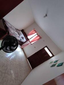 an overhead view of a room with a door and a fan at Apartamento Privado con acceso a Piscina in Santa Fe de Antioquia