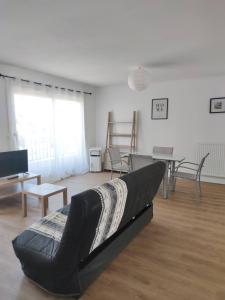 Posedenie v ubytovaní Grand Logement proche centre Parking gratuit