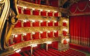 an empty theatre with red seats and a red curtain at Giardino Sul Mare in Vibo Valentia