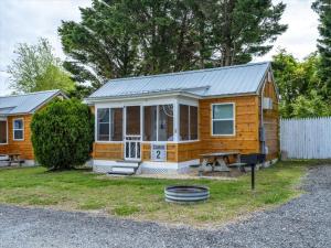 a tiny house on the side of a road at Beach Bum West-O Cabins in Ocean City