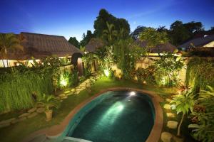 an overhead view of a swimming pool in a yard at Villa Seminyak Estate & Spa - By Astadala in Seminyak