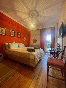 a bedroom with a large bed and a ceiling at Comfortable apartment in Thessaloniki in Thessaloniki