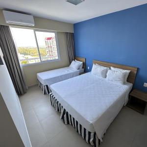 Krevet ili kreveti u jedinici u okviru objekta Thermas São Pedro Park Resort
