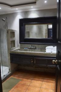 Ένα μπάνιο στο Hotel Villa Antigua