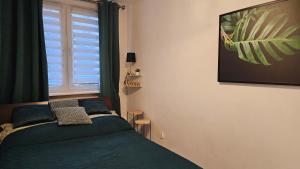 Posteľ alebo postele v izbe v ubytovaní Apartament Zielona Przystań Gdańsk