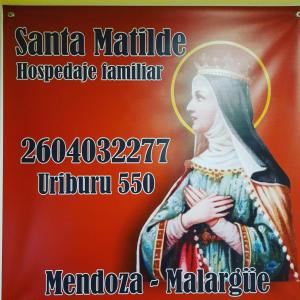 un póster para un concierto con una pintura de una mujer en Santa Matilde Hospedaje en Malargüe