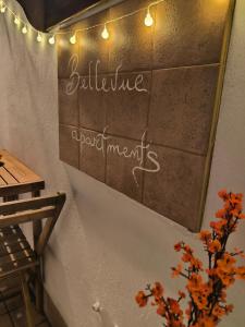 a wall with a sign that reads architecture absorbencies at BELLEVUE APARTMENTS in Sant'Agata de' Goti