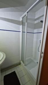 a bathroom with a shower and a sink at Le Gîte d'Isa in Beaune +14 photos
