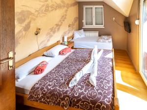 Giường trong phòng chung tại Vila Jovanovic