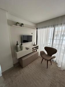 Posezení v ubytování O mais belo Apartamento a 50 metros da praia de Costa Azul