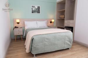 Postel nebo postele na pokoji v ubytování Hotel San Blas