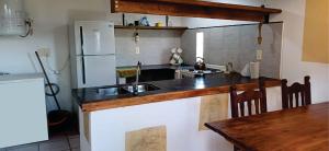 马德普拉塔CASA A 6 CUADRAS PLAYA PUNTA MOGOTES, P/6 PERS.的相册照片