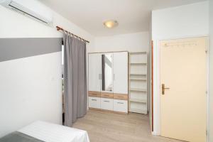 Posteľ alebo postele v izbe v ubytovaní Apartments Janjac