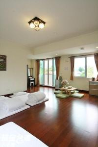 Postel nebo postele na pokoji v ubytování Ti Siang B&B