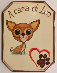 a drawing of a cat with a heart at Bed And Breakfast A CASA DI LEO in Tarquinia