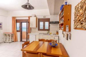 Kuchyň nebo kuchyňský kout v ubytování Alexander Beach Hotel