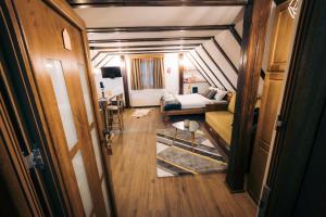 A bed or beds in a room at Vila Bajka