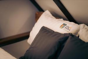 A bed or beds in a room at Vila Bajka