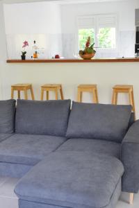 Posezení v ubytování Villa les MAHOGANYS
