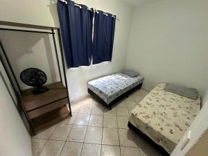 Voodi või voodid majutusasutuse Apart 3 quartos Fernaodias toas
