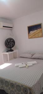Katil atau katil-katil dalam bilik di Praia do Caribessa - Quarto Privativo - Pedacinho do Paraíso