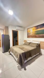 Postel nebo postele na pokoji v ubytování Makia Beach Experience B-002 Térreo Muro Alto Porto Galinhas + 22 fotografií