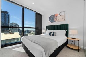 Postel nebo postele na pokoji v ubytování Aspire Melbourne + 17 fotografií