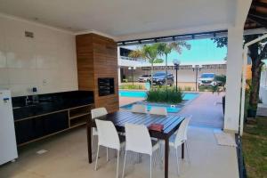 Bazén v ubytování #805 AConchegante Studio Urban WIFI nebo v jeho okolí