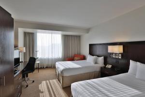 Letto o letti in una camera di Courtyard by Marriott Panama Metromall