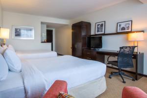 Letto o letti in una camera di Courtyard by Marriott Panama Metromall