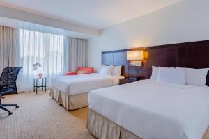 Letto o letti in una camera di Courtyard by Marriott Panama Metromall