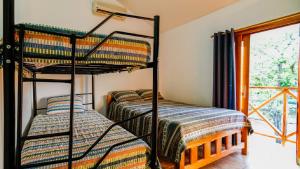 Giường trong phòng chung tại Casa tropical - Fabulous tropical house +18 ảnh