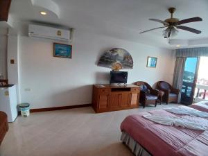 Postel nebo postele na pokoji v ubytování Aksarai hotel