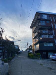 a building on the side of a street next to a building at Casa Valle Verde in Baguio