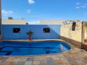 Bazén v ubytování Casa espaçosa com linda piscina nebo v jeho okolí